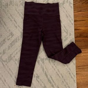 Athleta salutation II Capri purple space dye stash pocket
